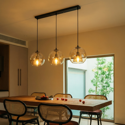 Modern double-layer glass globe pendant light in smoke grey and amber for kitchen island and dining room